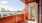 patio with views of landscaping and near neighborhood