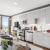 living area that includes ample seating spaces and bright lighting