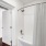 bathroom with a tub